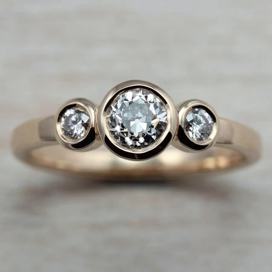 Diamonds and 14k Yellow Gold Three Stone Ring