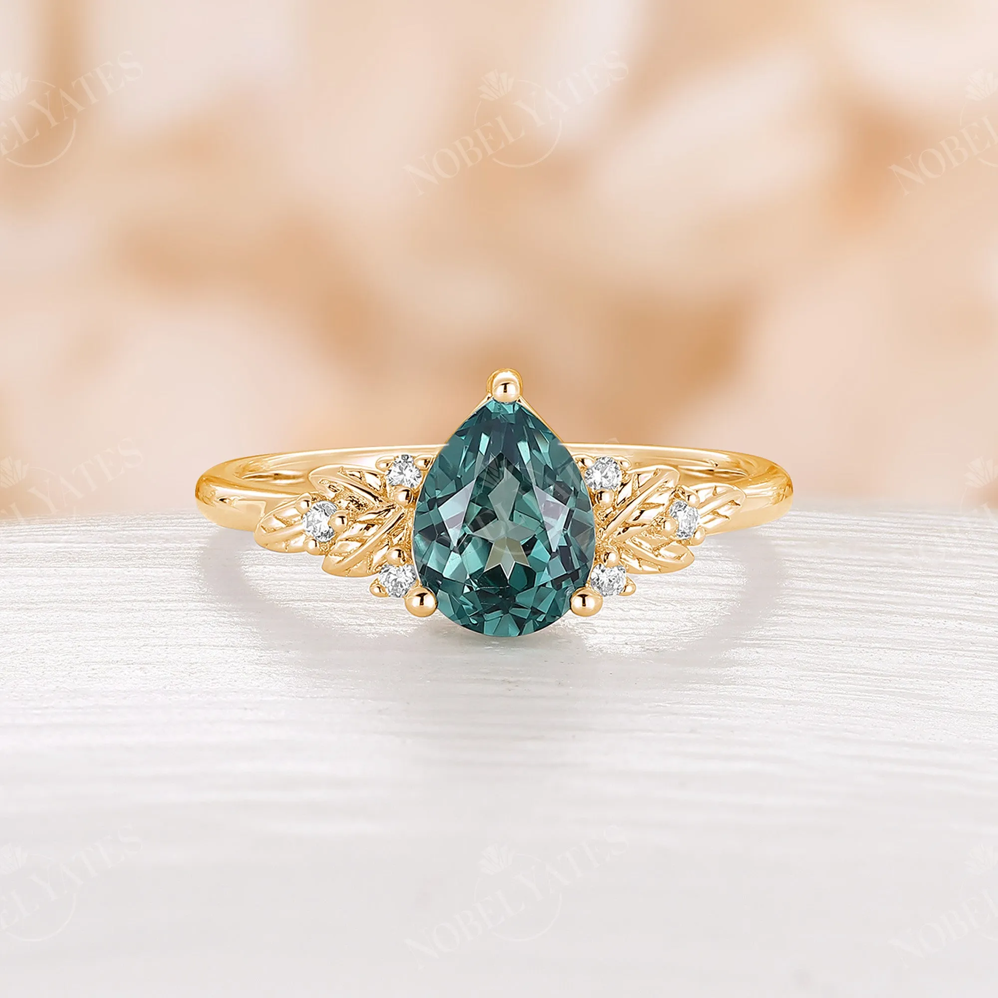 Nature Lab Green Sapphire Pear Cut Engagement Ring Yellow Gold