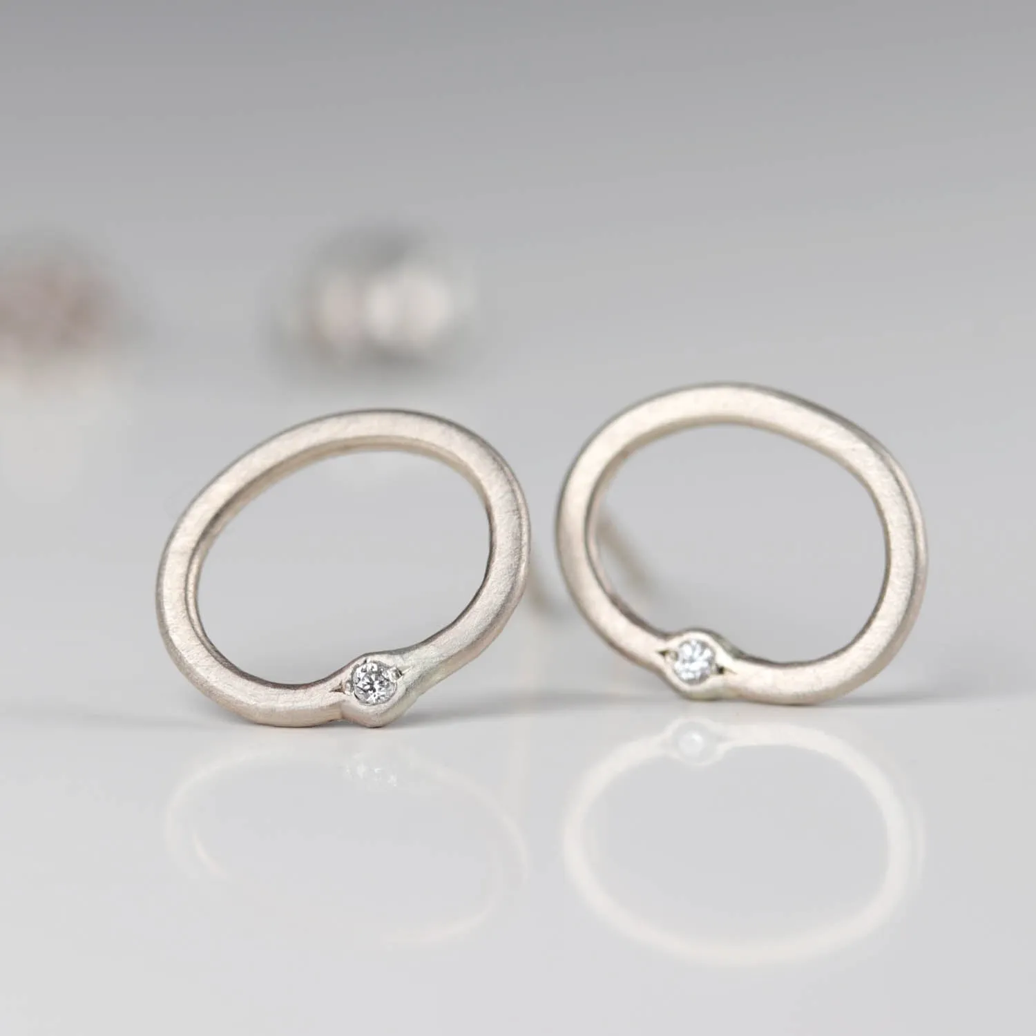 Oval Bead-set Diamond Stud Earrings