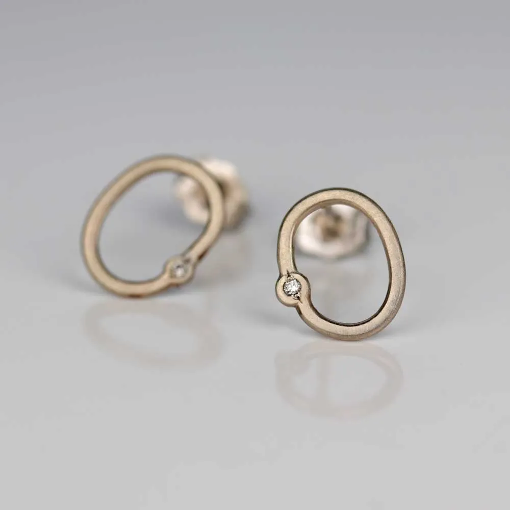 Oval Bead-set Diamond Stud Earrings