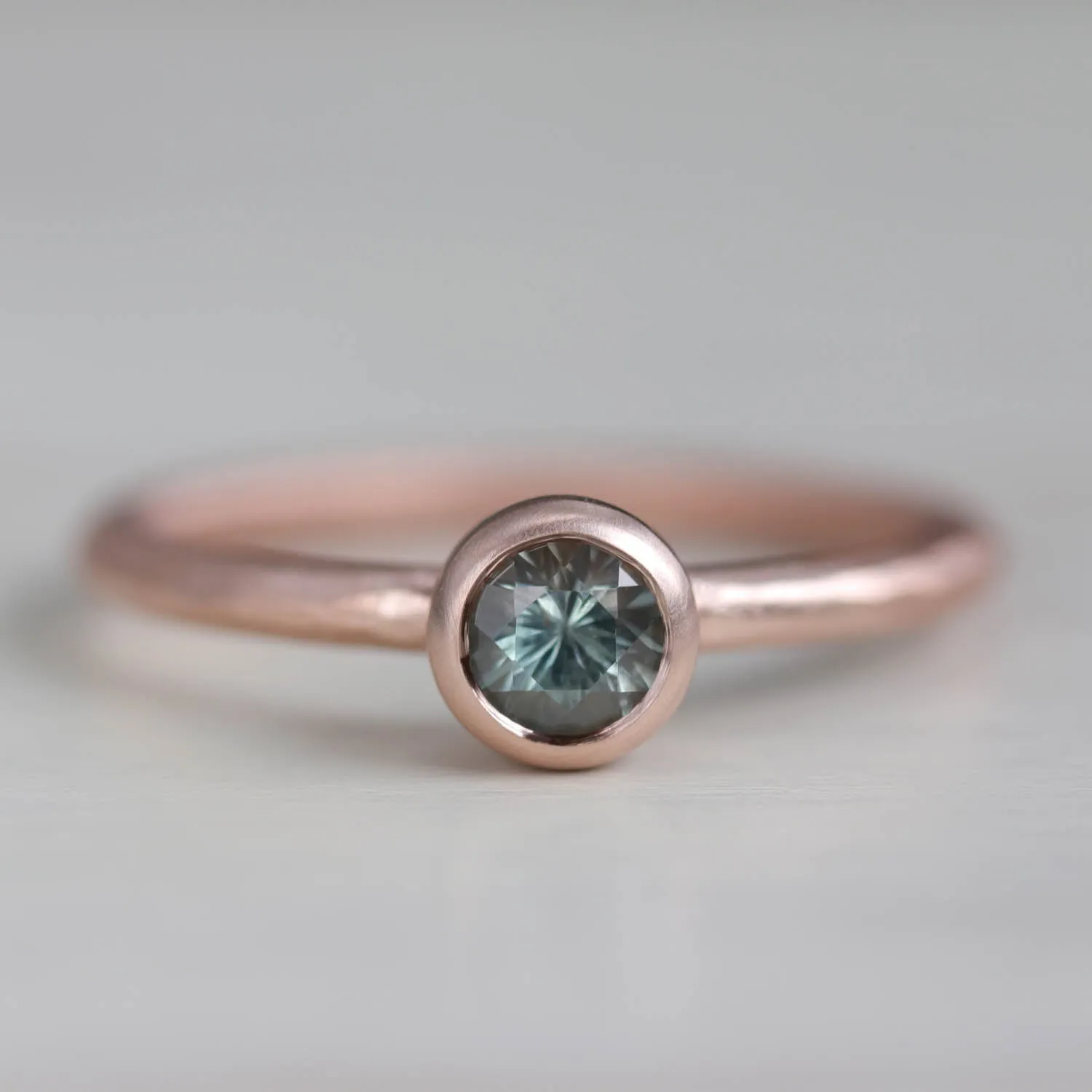 Rustic Solitaire Engagement Ring with Teal Montana Sapphire