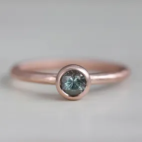 Rustic Solitaire Engagement Ring with Teal Montana Sapphire